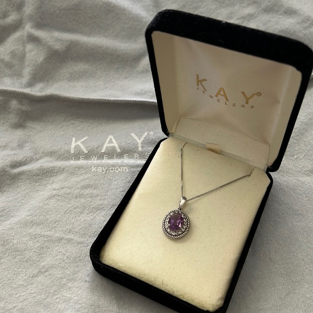 Womens Amethyst Stone necklace set in 925 Silver with a 10K White Gold chain.